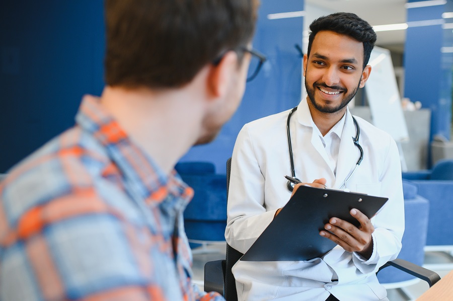 Doctor smiling at patient